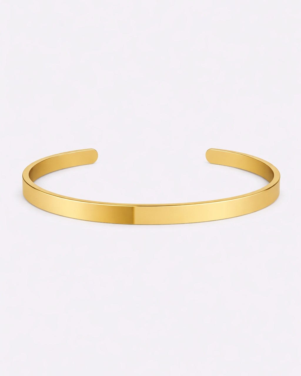 Gold bangle on a white background